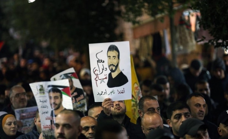 وقفة دعم للأسير ناصر أبوحميد والمطالبة باسترداد جثامين الشهداء في جنين