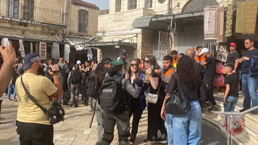 The occupation injures 33 civilians and arrests 14 during the funeral of the martyr Sherine Abu Aqleh