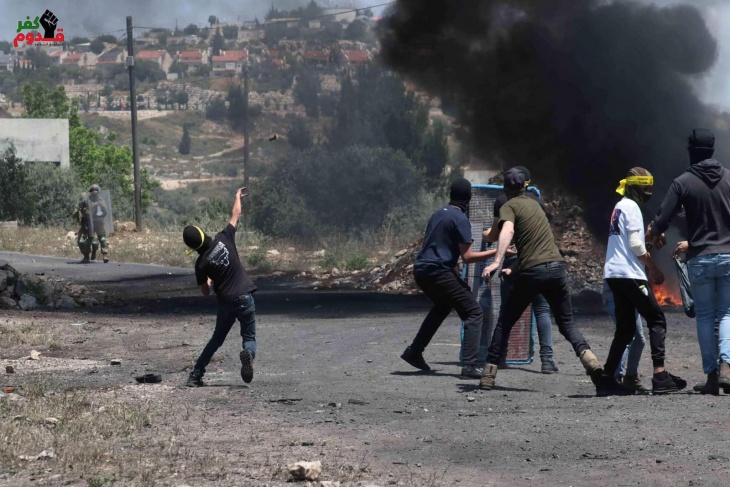 4 young men were injured by the occupation bullets and dozens suffocated during the suppression of the Kafr Qaddoum march