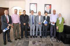 The Department of Refugee Affairs (the organization) discusses with a delegation (JICA) support for development projects in the Palestinian camps