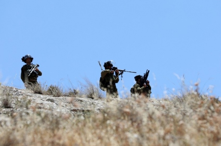 Firing at an army force in the northern West Bank