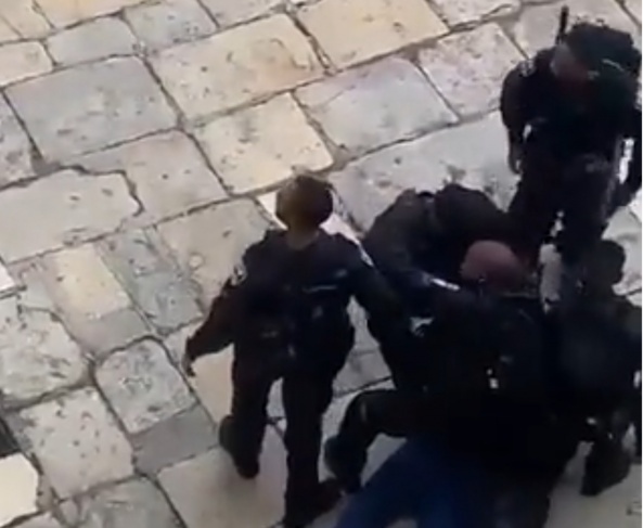 After attacking him, the occupation forces arrested a young man from Al-Aqsa