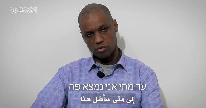 Al-Qassam Brigades displays a video message to its captive soldier, Avraham Mengistu.
