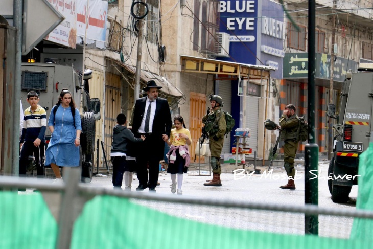 Settlers storm downtown Hebron and Yatta Municipality Park