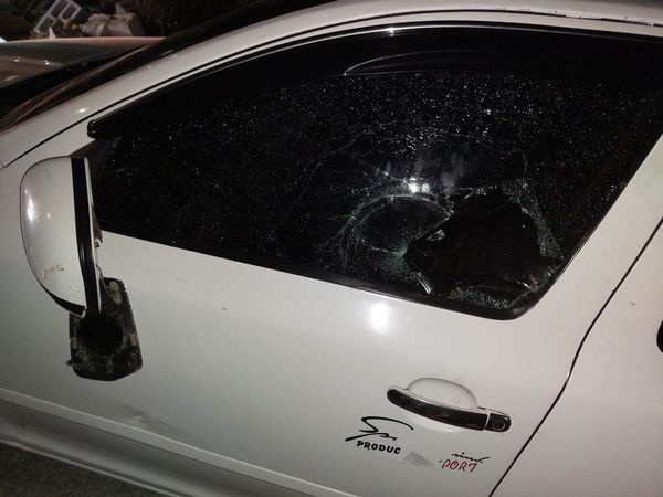 A car destroyed by settlers east of Salfit