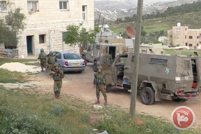 The occupation arrests a boy during clashes in Nabi Saleh