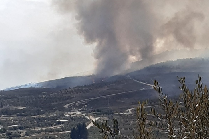 Settlers set fire to lands in Husan